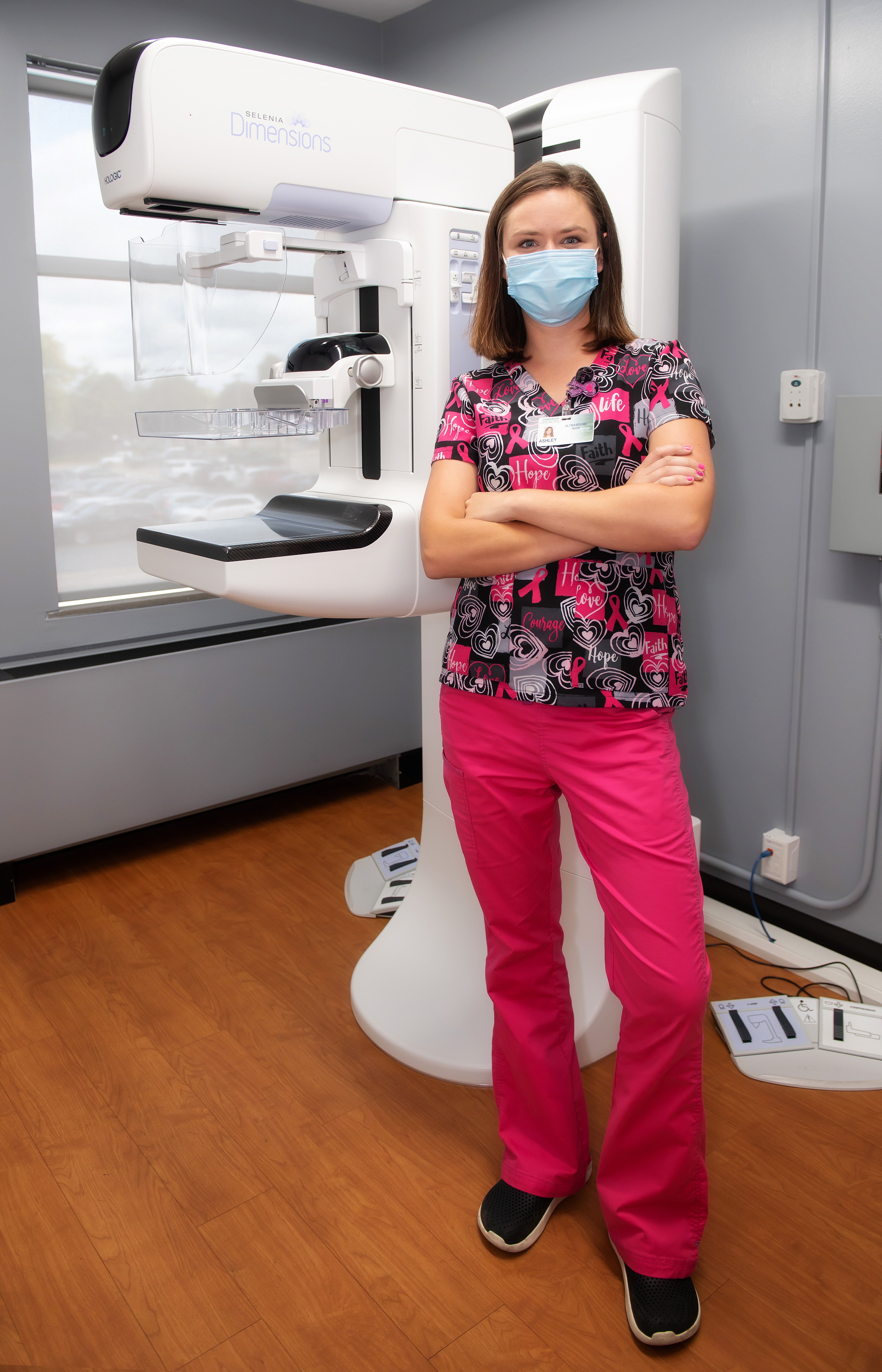 Mammography Technologist Ashley McBee is pictured next to Gundersen Boscobel's new 3D breast imaging system. 